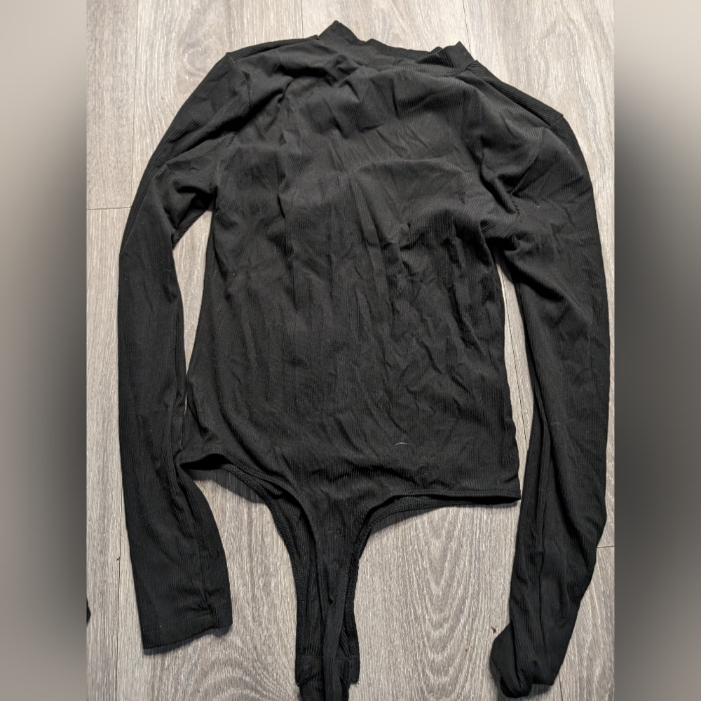 Polly Esther small black long sleeve body suit